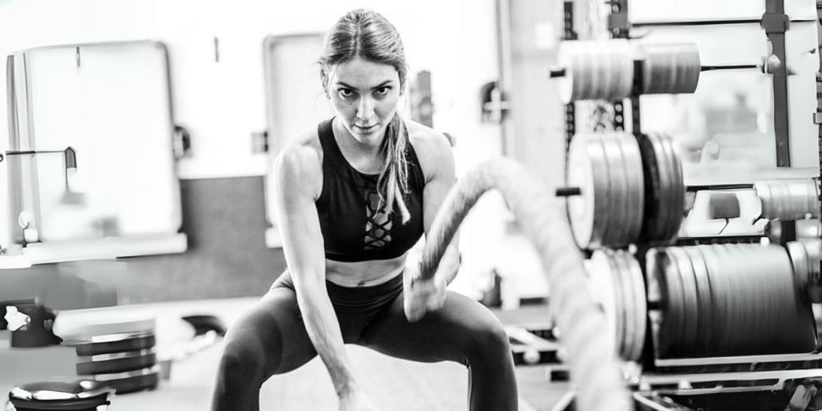 Stark student and trainee working out with ropes in Stark gym