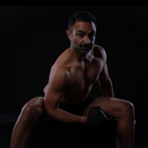 Ali Bajwa posing for Stark Naked 2024